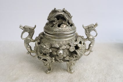 A white bronze covered censer