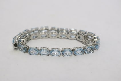 A sterling bracelet with blue topaz