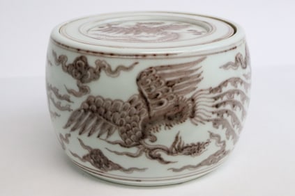 A red and white porcelain tea caddy