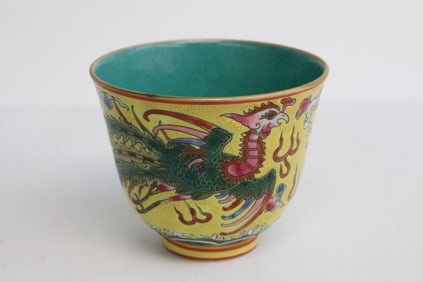 A yellow background porcelain tea cup