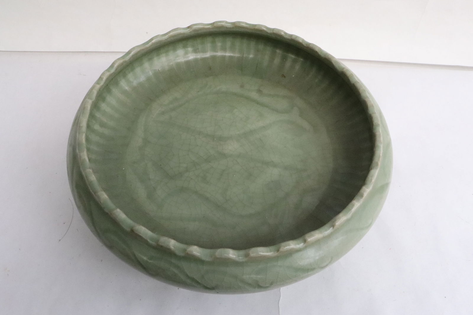 Celadon porcelain brush wash: Celadon porcelain brush wash embossed with double fish motif decoration, 2.45"x8.7"dia