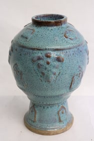 A light blue porcelain vase