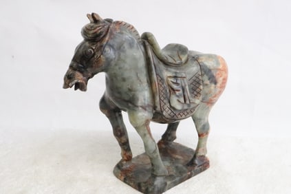 A jade like stone sculpture of horse