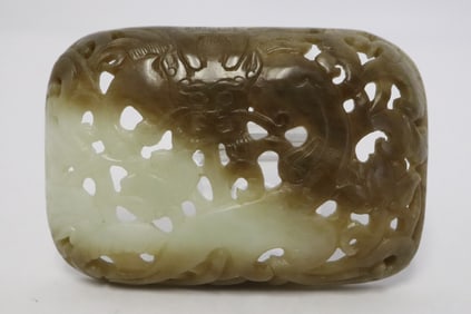 A celadon jade carved ornament