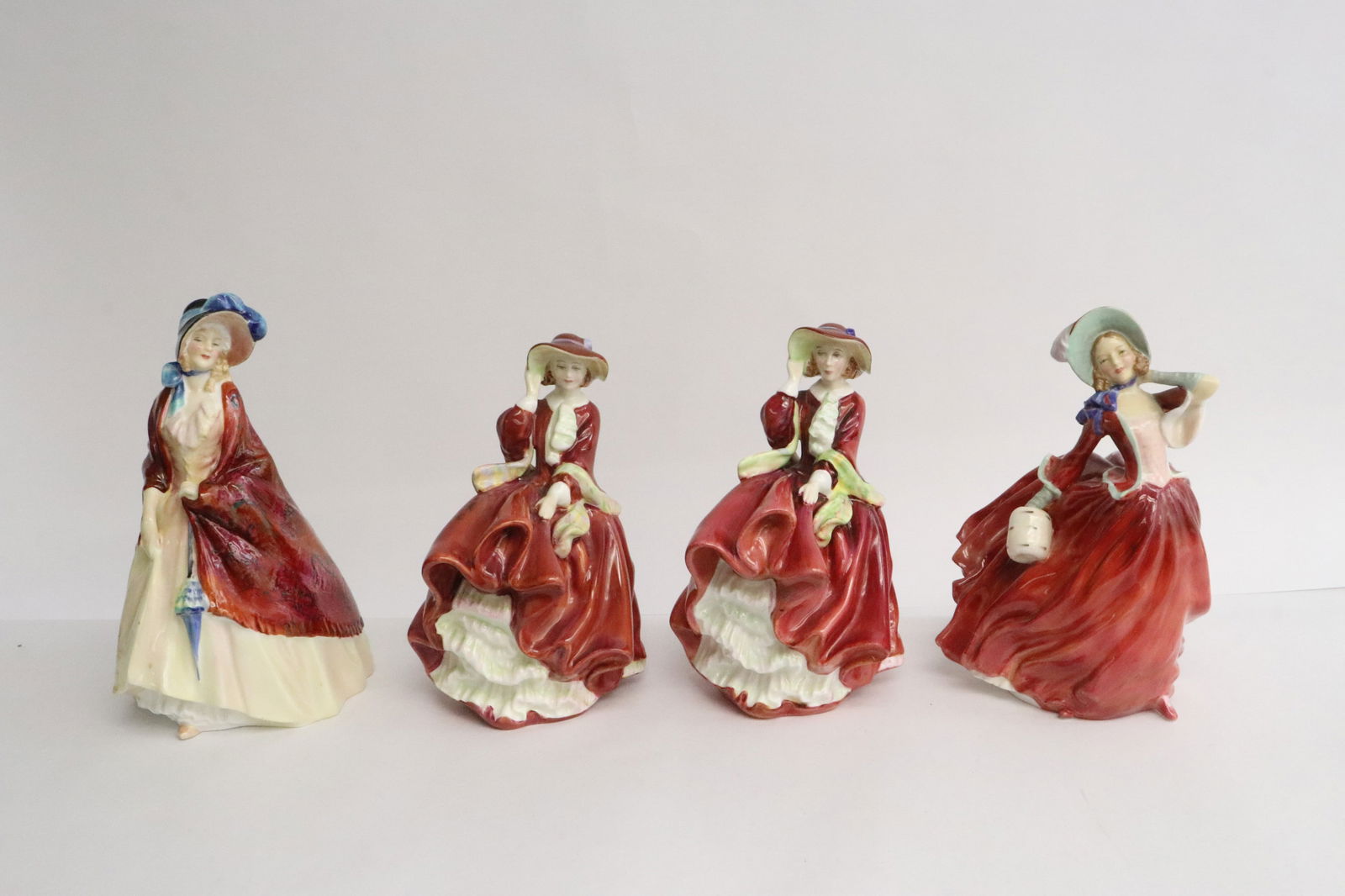 4 Royal Doulton figures (1 of 11)