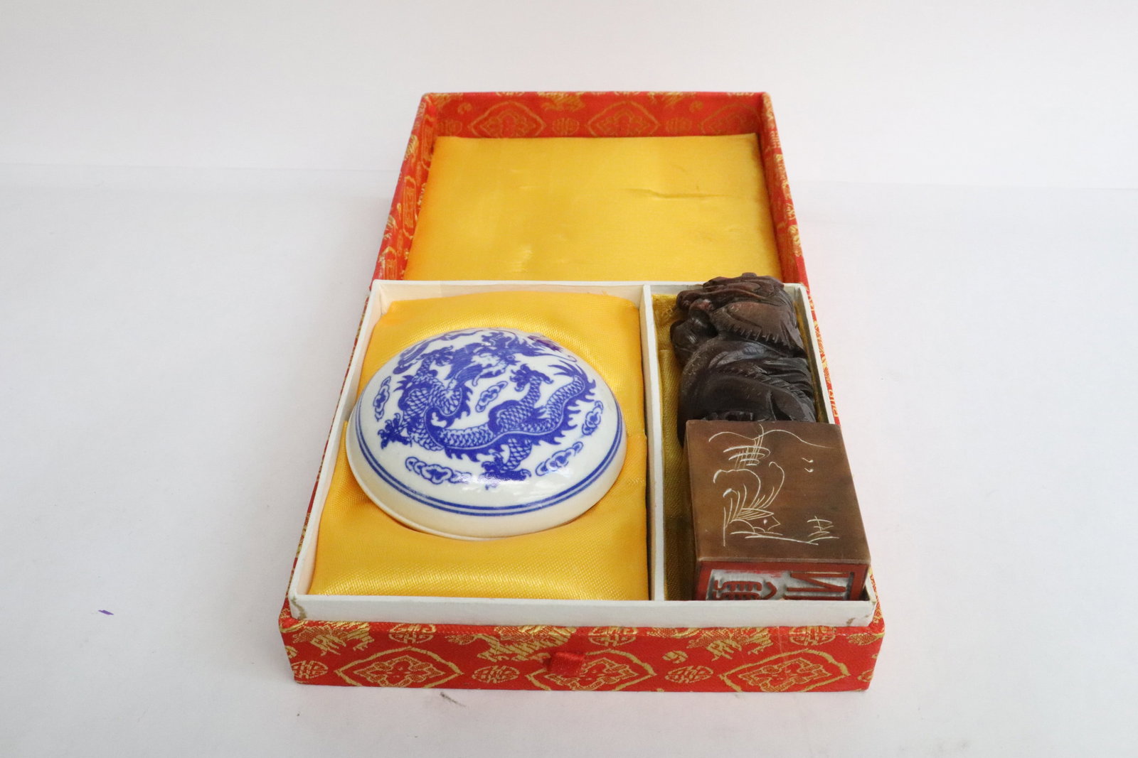 Chinese soapstone seal, and a blue & white ink box: Chinese soapstone seal (4.75"x1.6"x1.6"), and a blue and white ink box (1.5"x3.1"dia)