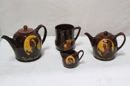4 pieces; 2 Royal Doulton teapots, and 2 mugs