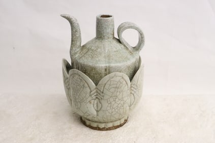 A celadon crackleware wine server w/ under bowl