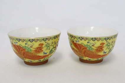 Pair Chinese yellow background porcelain tea cups