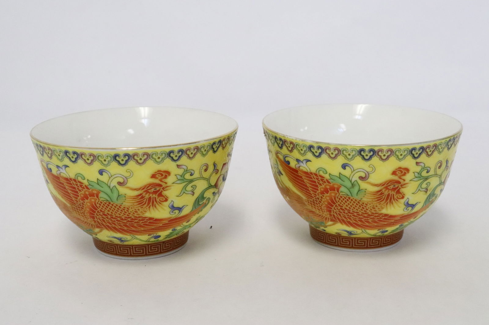 Pair Chinese yellow background porcelain tea cups (1 of 8)