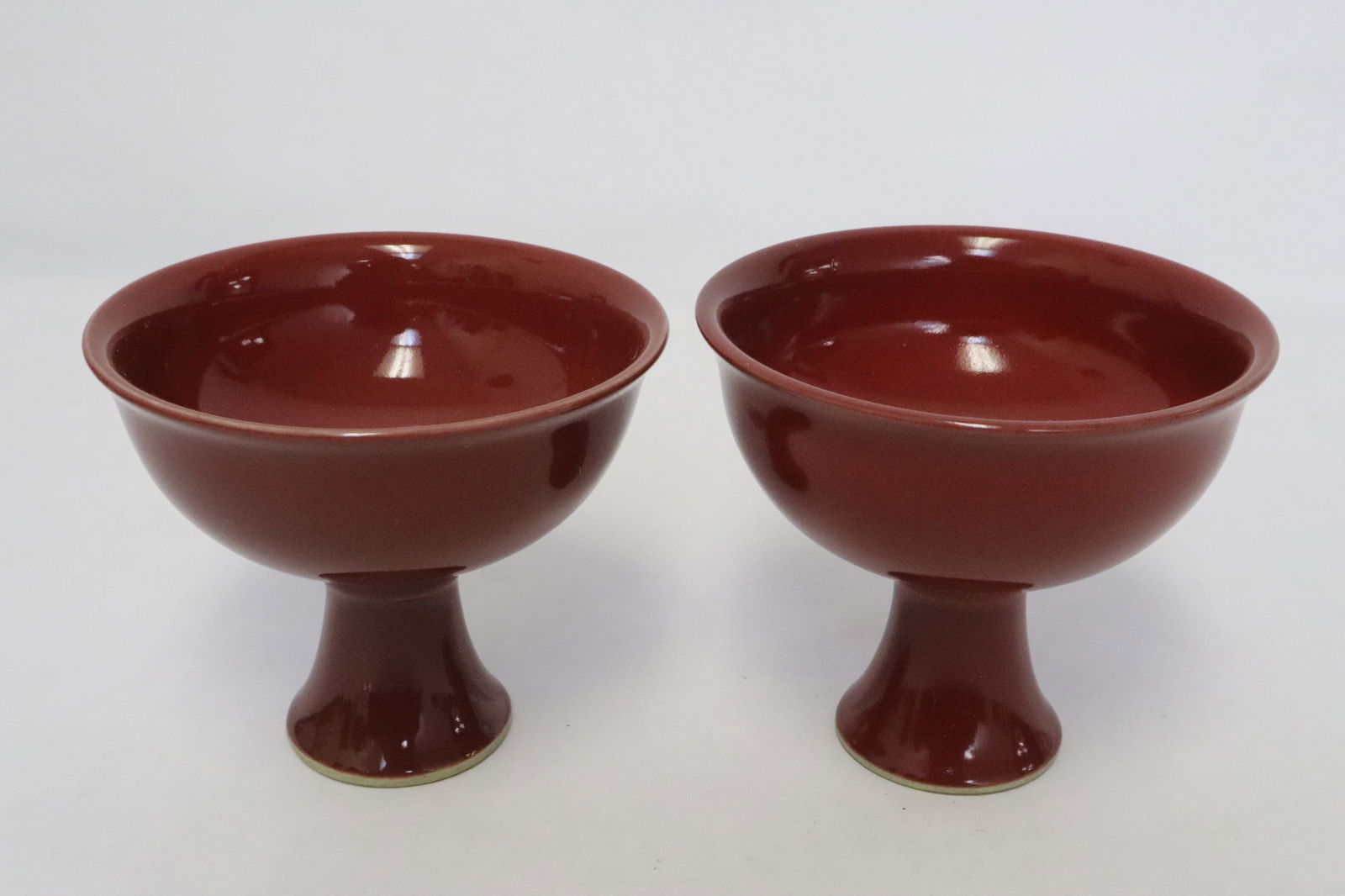 Pair red glazed porcelain stem cups (1 of 8)