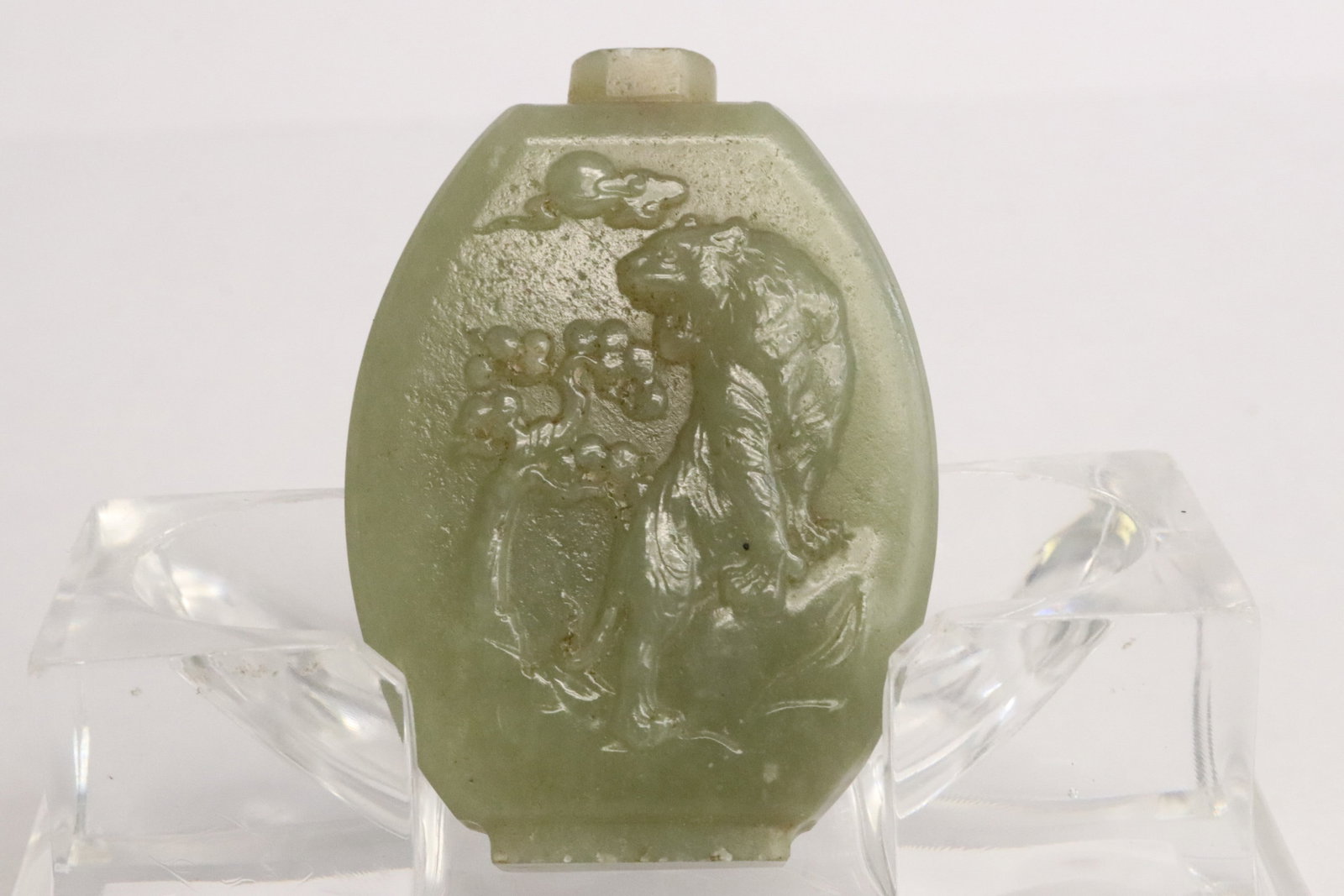 Stone carved snuff bottle: Stone carved snuff bottle, 2.3"x1.65"x0.6"
