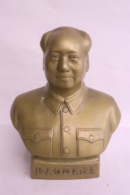 A brass sculpture of Chairman Mao