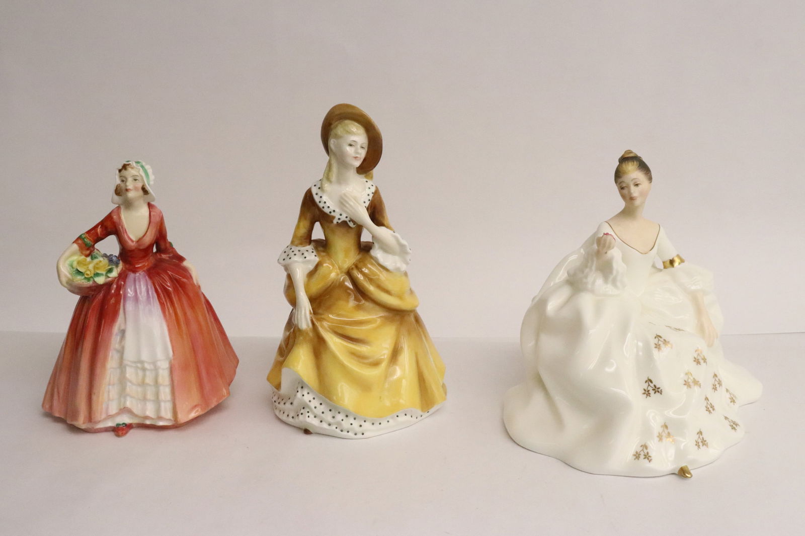 3 Royal Doulton figures (1 of 12)