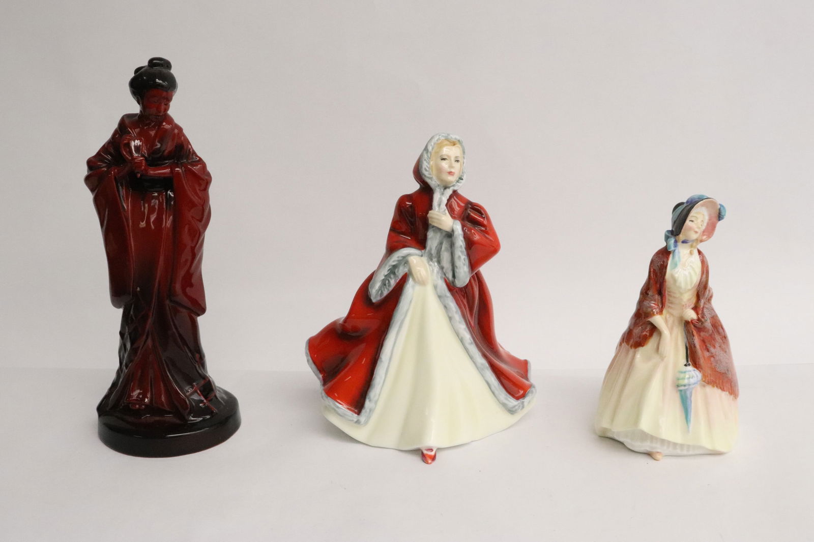 3 Royal Doulton figures (1 of 12)