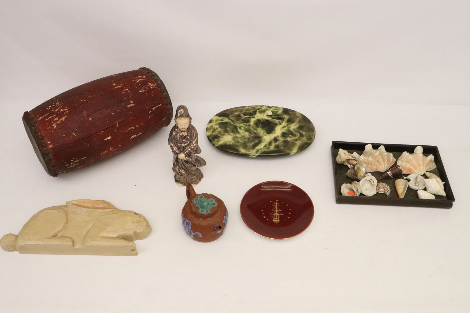 Lot of misc.: Lot of misc.; antique Chinese drum (14"x7.8"dia), Yixing teapot (3.85"x6.7"x4.25"), shells, & misc.