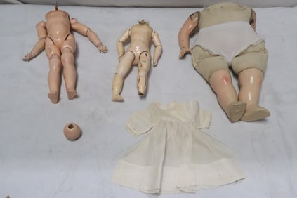 Lot of antique doll bodies, doll parts