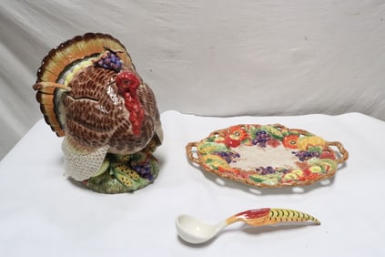 A massive porcelain tureen with underplate