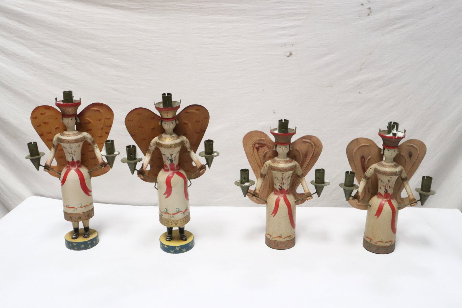 4 painted wood figure motif candle holders: 4 painted wood figure motif candle holders, 13"H - 15.85"H
