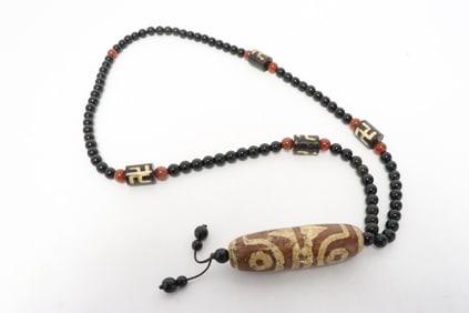 Necklace with dzi style bead