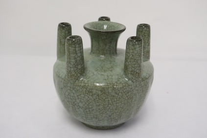 A grey glazed crackleware porcelain 6-hole vase