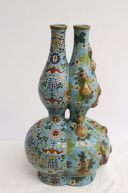 Chinese blue background famille rose twin vase