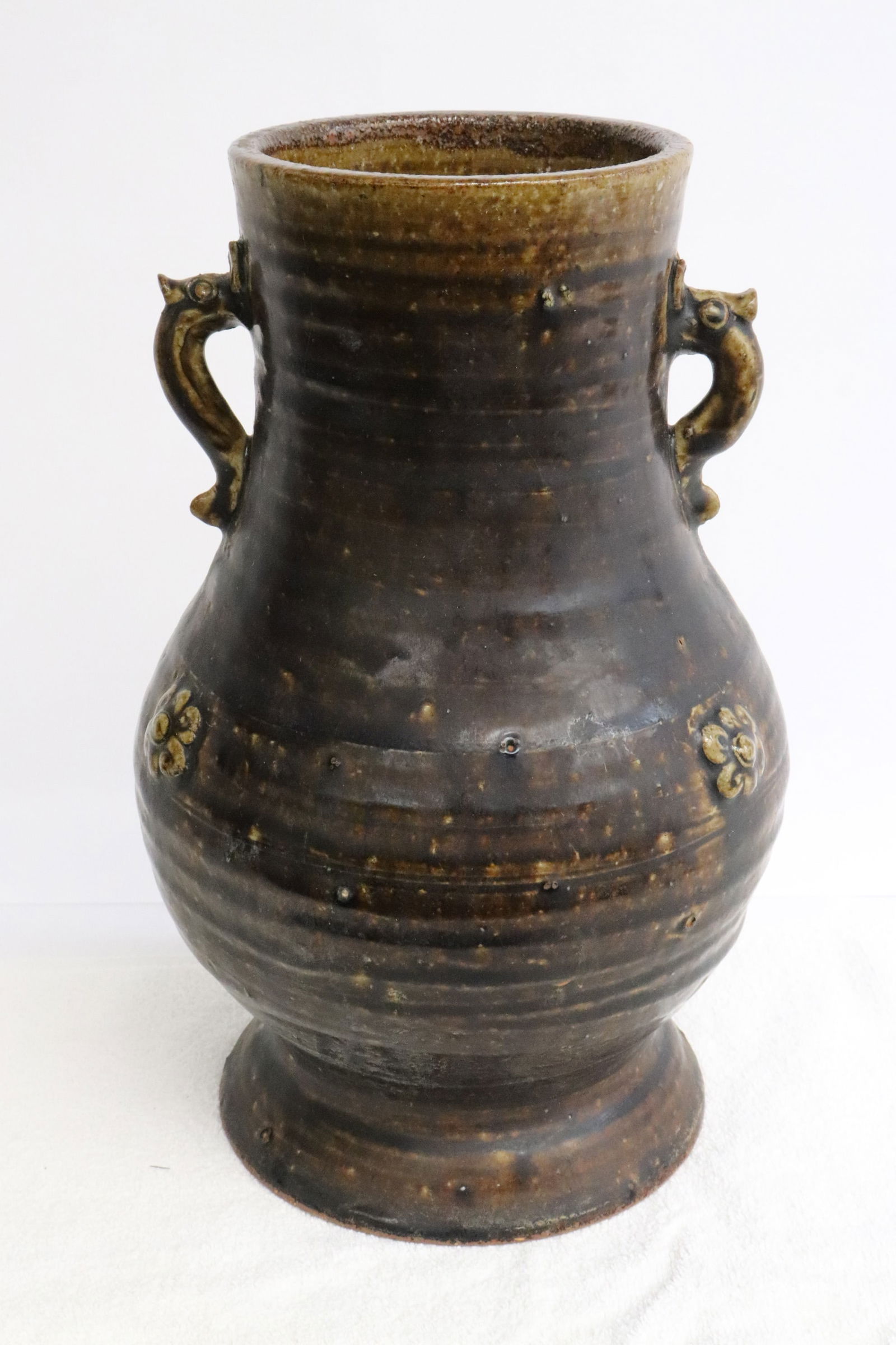 A brown glazed earthenware jar (1 of 11)