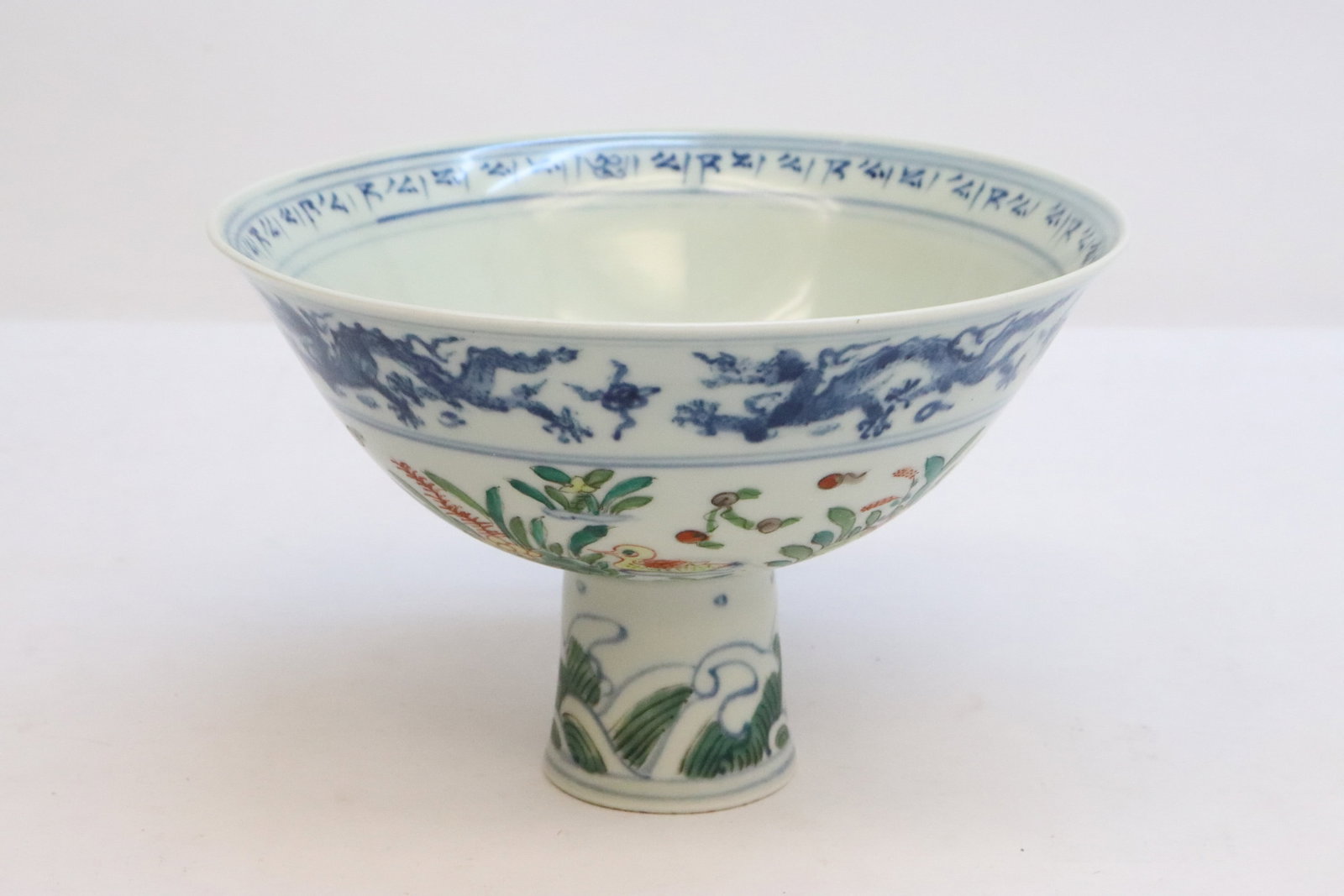 Large Chinese famille rose porcelain stem bowl: Large Chinese famille rose porcelain stem bowl decorated with dragon and flowers, 4.45"x6.8"dia
