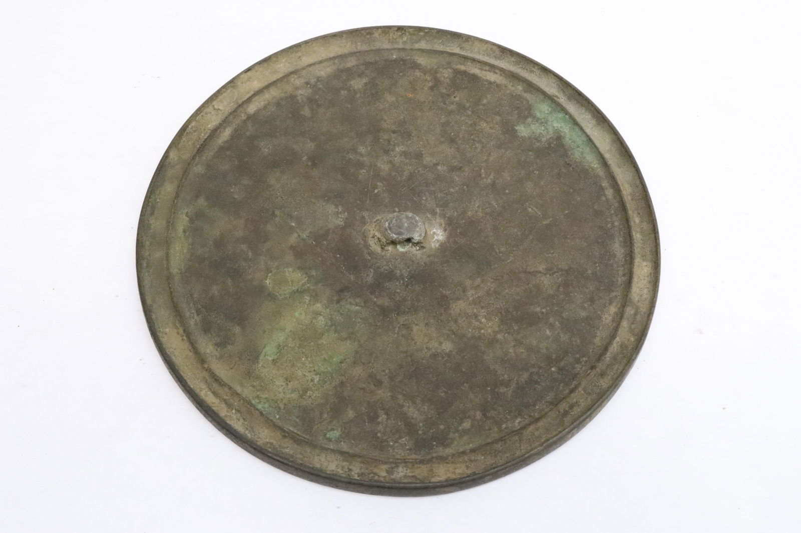 A vintage Chinese bronze mirror: A vintage Chinese bronze mirror, 0.45"x6.85"dia