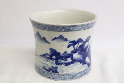A large blue and white porcelain brush holder