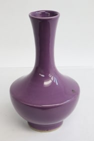 A purple glazed porcelain vase
