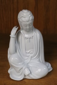 A blanc de shin porcelain sculpture of deity