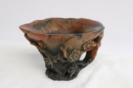 A horn style libation cup