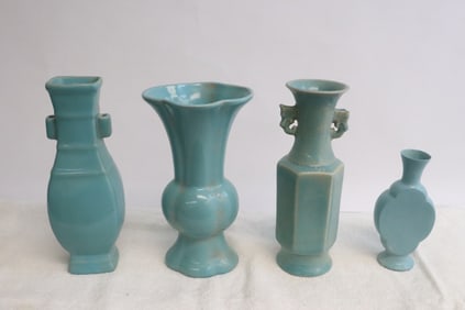 4 blue glazed porcelain vases