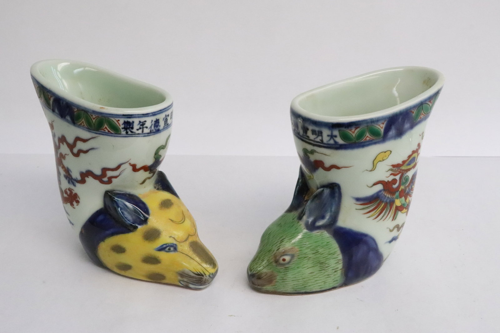 2 wucai porcelain wine cups: 2 wucai porcelain wine cups, 4.6"x4.8"x2.25", 4.6"x5.2"x2.15"