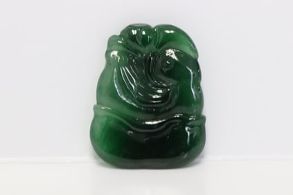 A jadeite carved ornament w/ GIA report