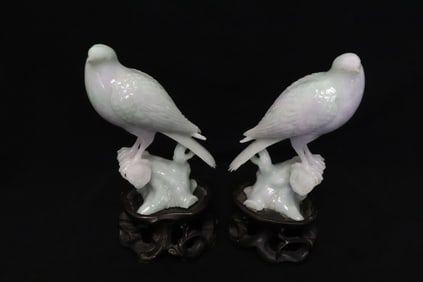Pair 19th/20th c. light apple green jadeite carved birds