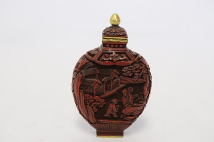 Chinese 18th/19th c. carved cinnabar snuff bottle, Qianlong mark