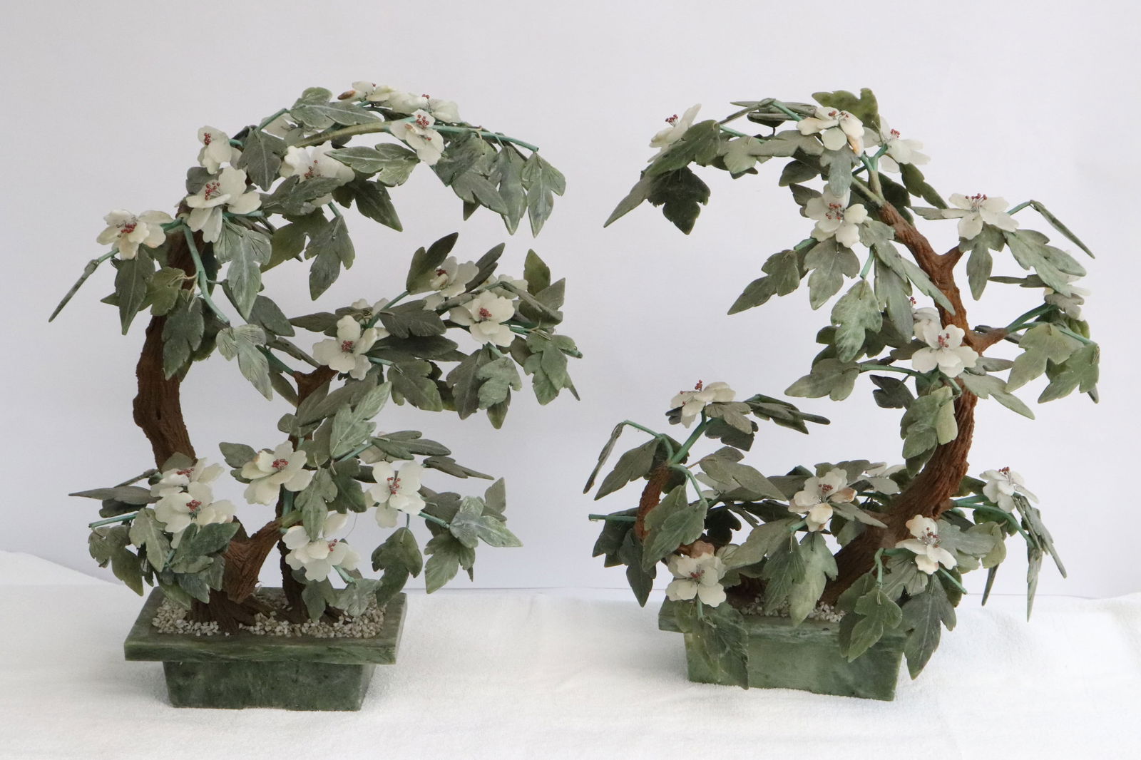 Pair jade trees with jade like stone planters (1 of 11)