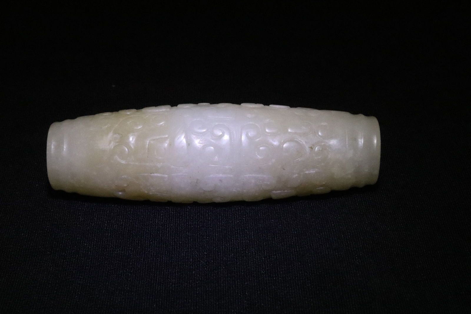 Chinese 18th/19th century white jade drop: Chinese 18th/19th century white jade drop with taotie pattern decoration, 清十八至十九世紀白玉墜, 2.65"x0.8"dia