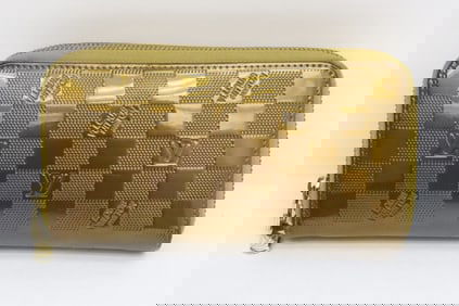 A wallet style purse, interior worn