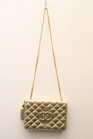 A golden lady's shoulder bag