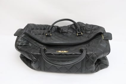 A large black traveling bag