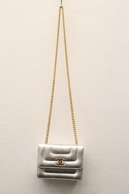 A silver lady's shoulder bag