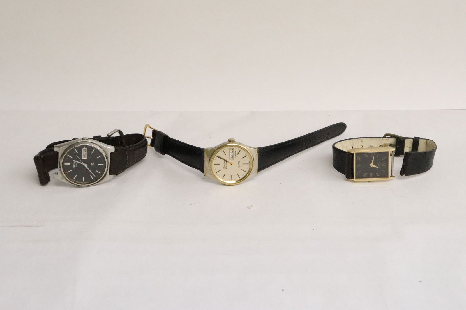 3 watches: 3 watches; 2 Seiko, and one Bulova day/date (missing crown)