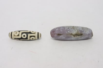 2 beads; one dzi bead, one possible agate bead