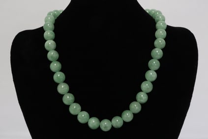 A jadeite bead necklace