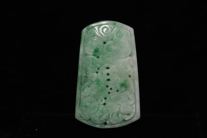 An apple green jadeite carved ornament