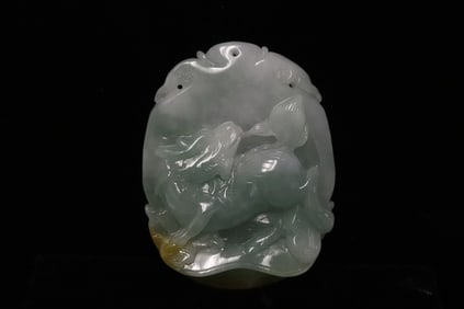 A light apple green jadeite carved ornament