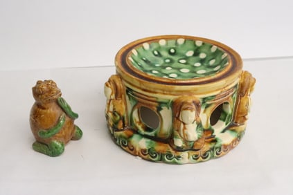 a sancai stand, and a sancai sculpture of frog